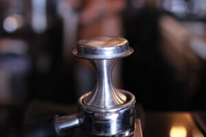 how to tamp coffee