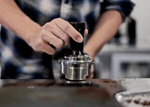 how to tamp coffee